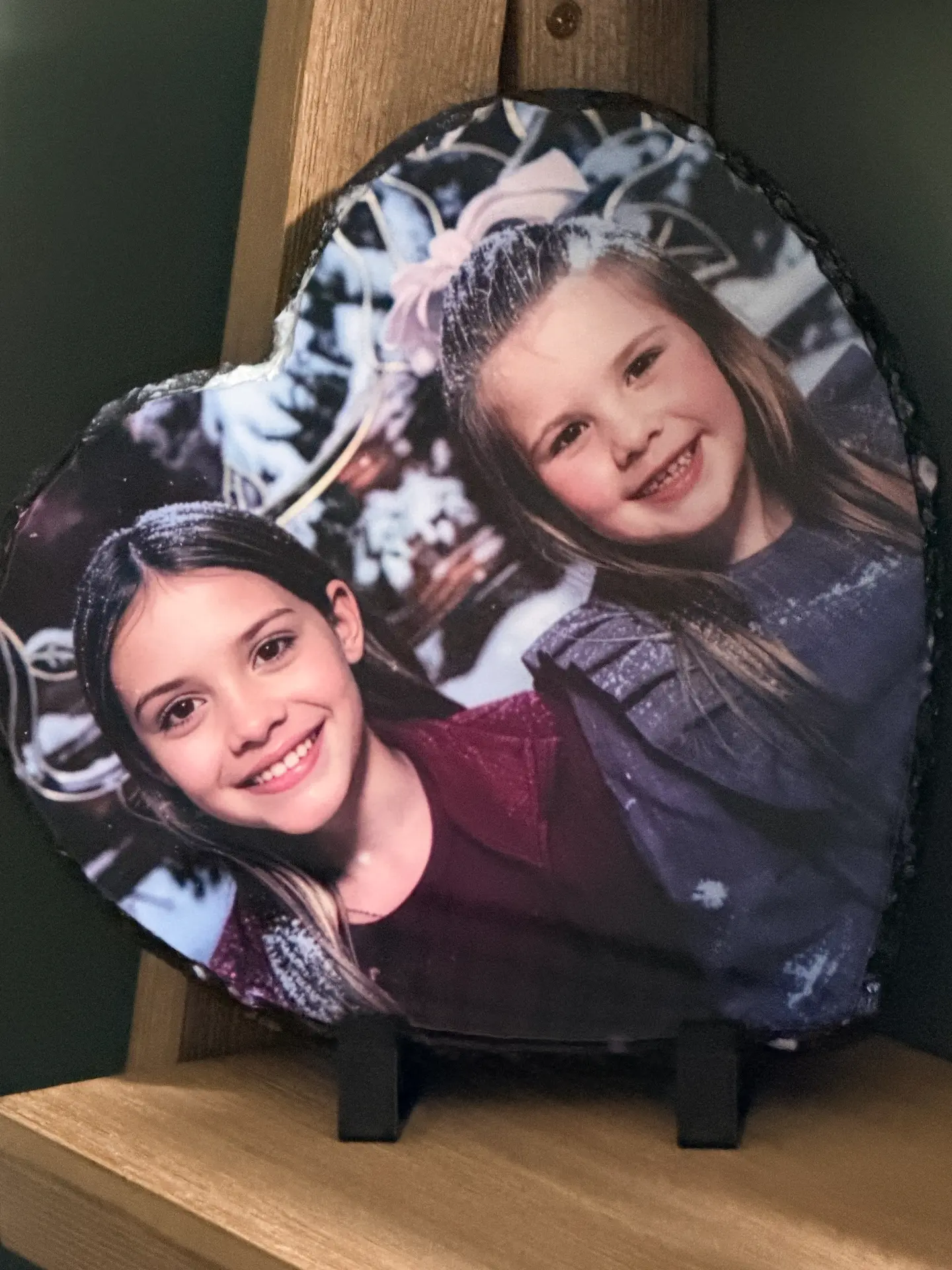 Ames Made Goods large heart photo slate with two children's portraits, displayed on a stand